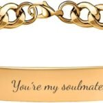 Gold tone engraved ID bracelet with a custom name plate
