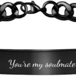 Black engraved ID bracelet with a curb chain
