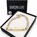 Gold plated Figaro bracelet presented in its gift box
